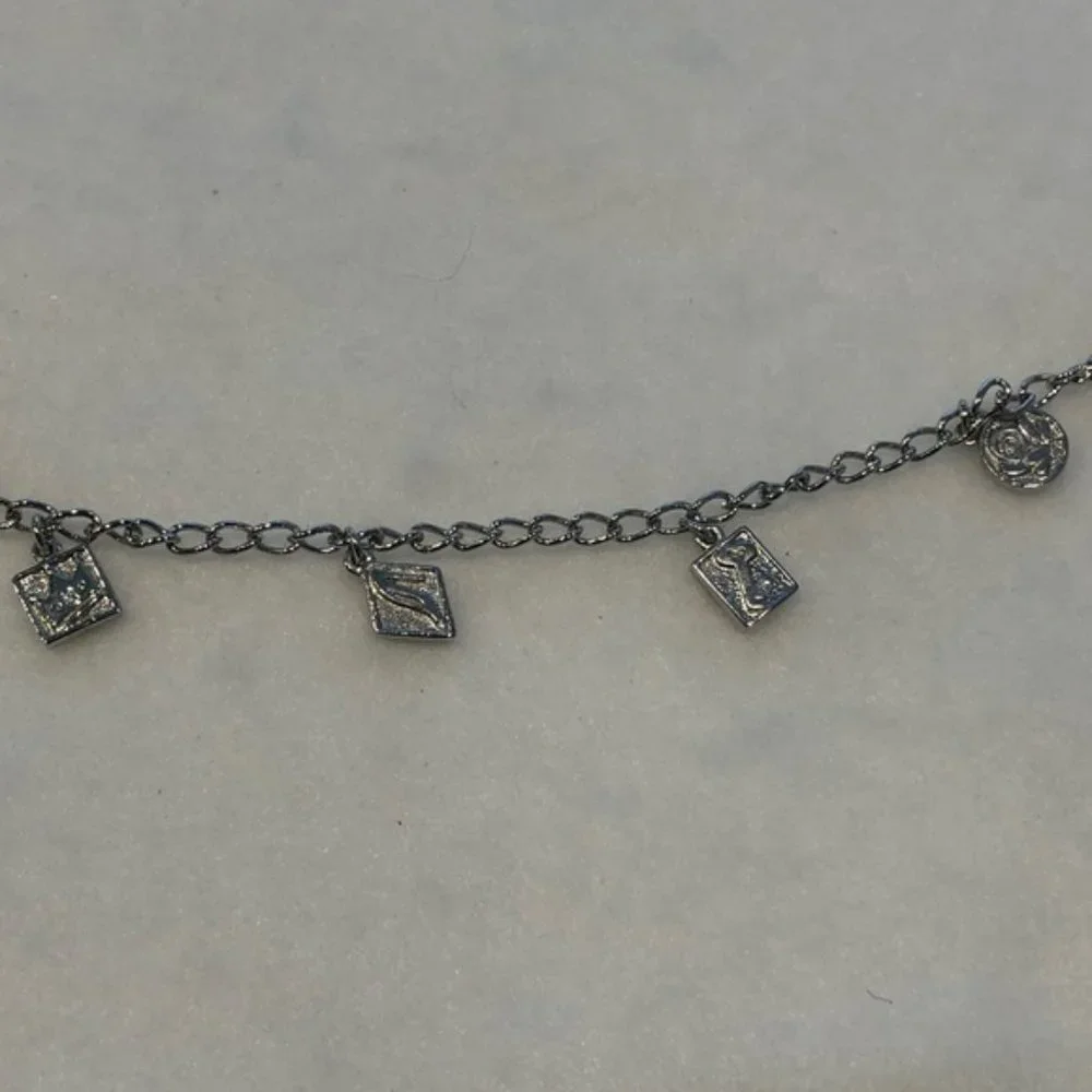 SILVER TONE BARBIE CHARM BRACELET